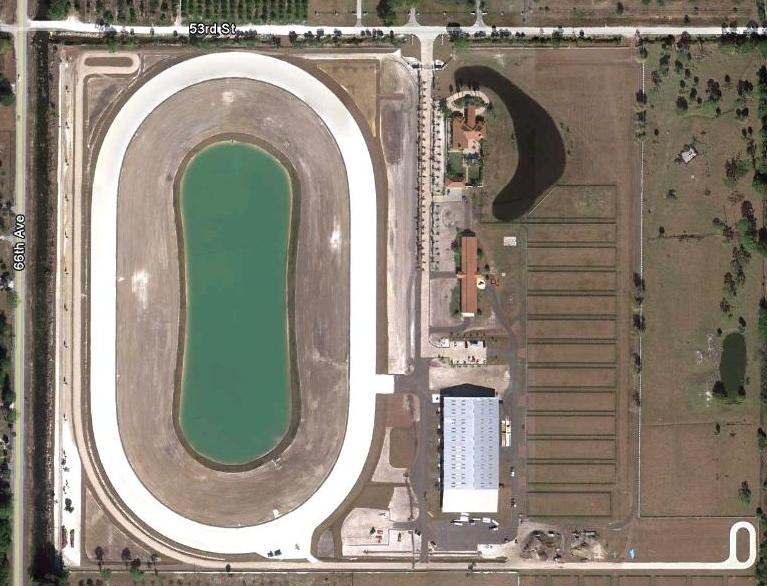 Scope of Work - Thoroughbred Training Facility: Construction of a 58 acre commercial horse track and training facility. The stables house up to 92 horses, has 20 paddocks, two training tracks and a 900 meter straight track.